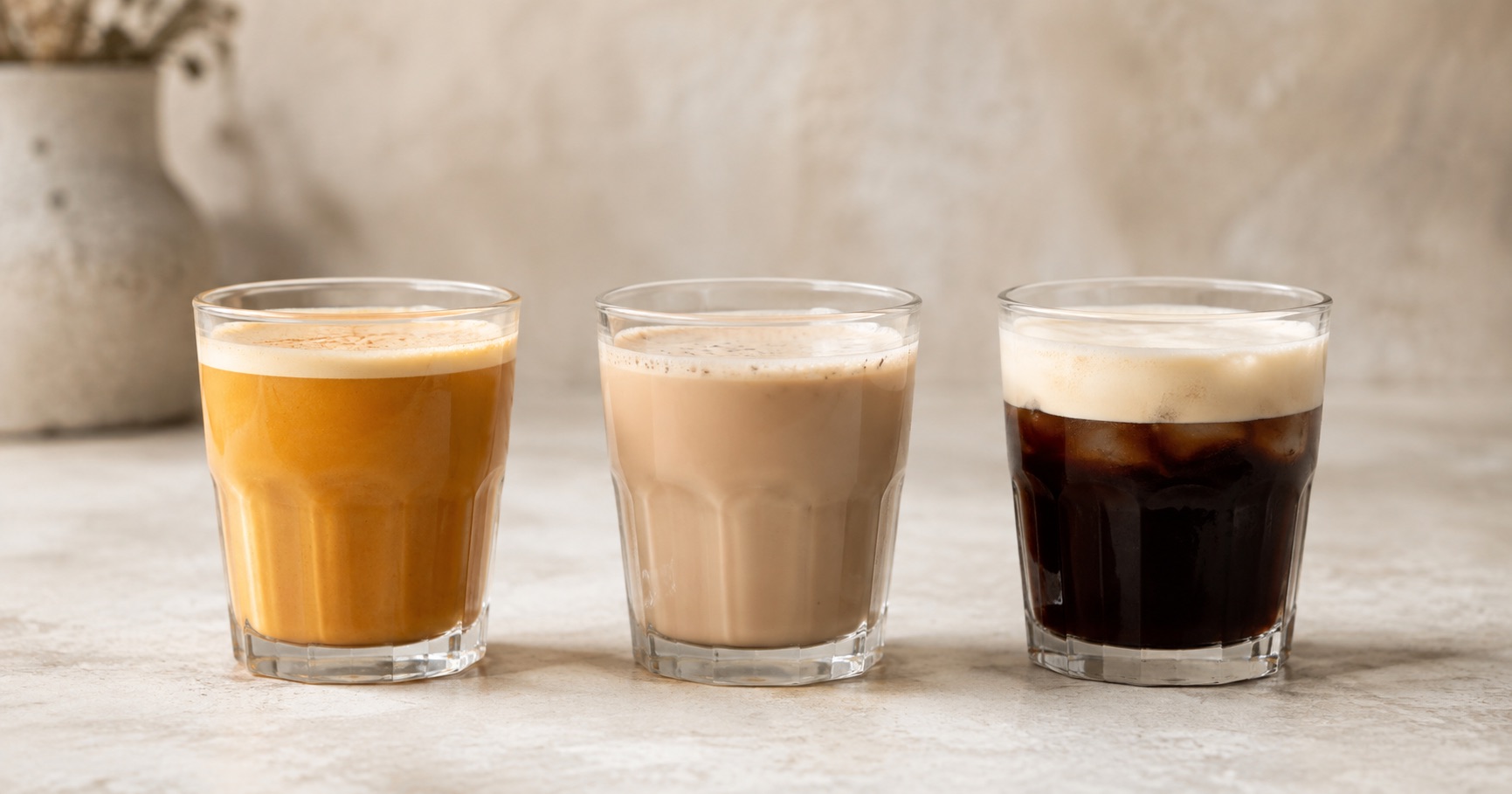 Iced coffee drinks with flavoured syrups and cold foam